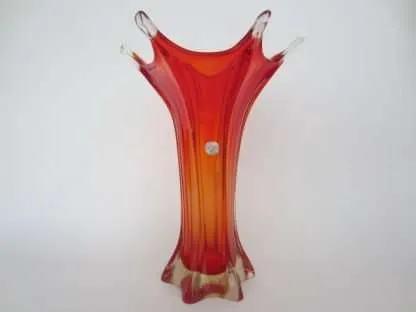 Exquisite mid century Italian art glass vase shades of red amberina rising to vibrant red dipped in clear uranium glass that glows under UV 